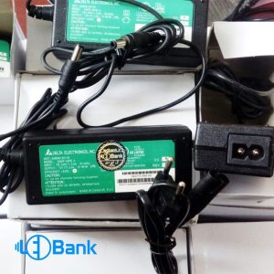 آداپتور سوئیچینگ 12 ولت 2 آمپر پلاستیکی بین راهی همراه سیم برق نظامی